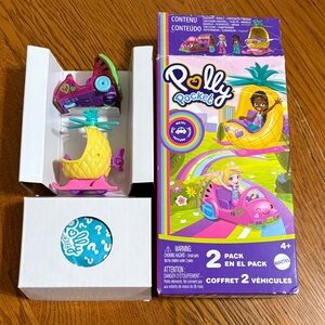 Polly pocket 2 vechiles with dolls. New in box
